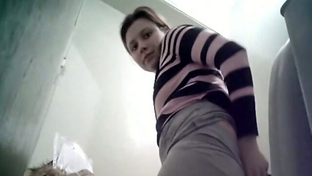 Cute young shy girl actually sees hidden cam in the toilet