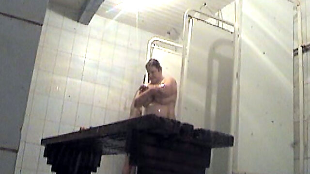 Chunky white milf housewife in the public shower room on hidden cam video