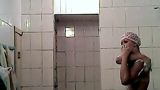 White lady with pointy boobies in the public shower room