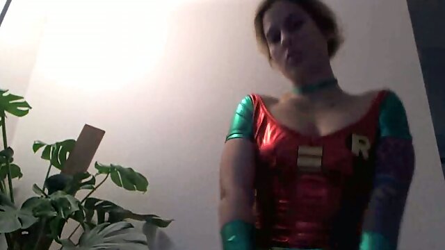 Beautiful and sexy babe posing for me in superman costume