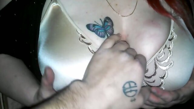 Tattooed whore with saggy big boobs gives my buddy a lewd titfuck