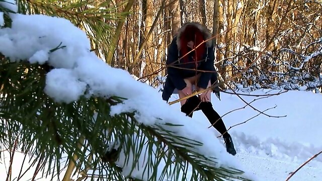 Russian redhead amateur beauty in the winter forest pisses