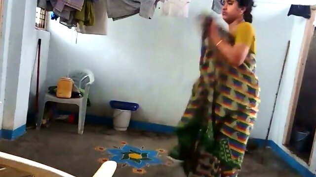 Indian amateur housewife was caught on hidden cam while undressing