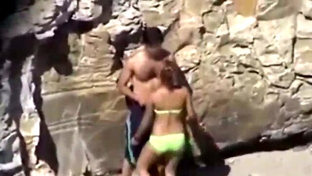 Horny girlfriend seduced her man for a quickie behind the rock