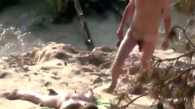 Spying on amateur couple having dirty sex on a beach