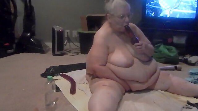 Extremely chubby disgusting old lady sucked her dildo on webcam