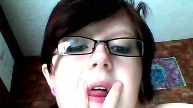 Nerdy short haired chubby webcam nympho in glasses tickles her twat