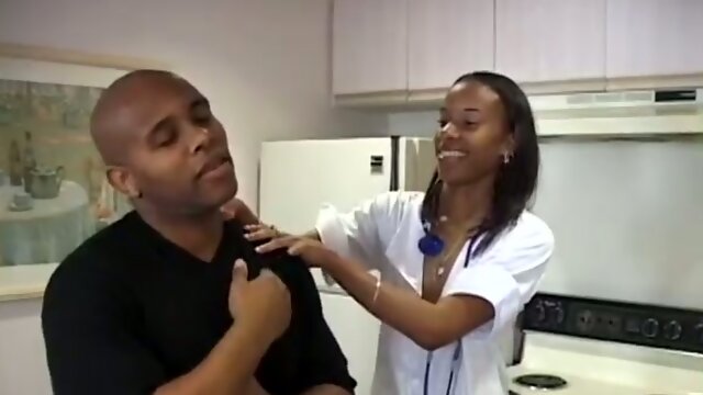 Slim ebony nurse enjoys hot oral sex in the kitchen