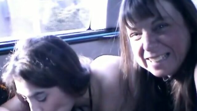 Two brown-haired skanks show their blowjob skills to a black dude