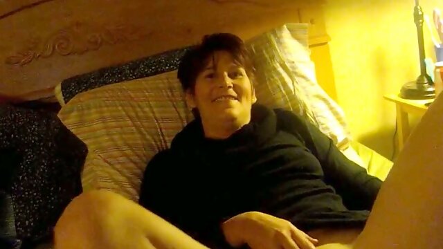 Mature chubby wife masturbates and smokes in bed on cam