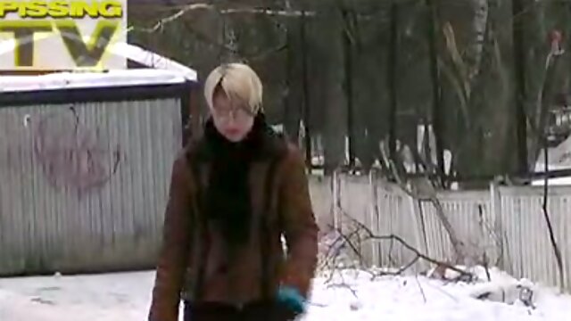 Just a Russian blonde amateur woman pees under the tree