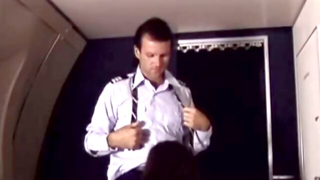 Captain and flight attendant having wild sex on the plane