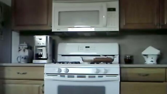 I fuck my wet pussy with my sex toy in my cozy kitchen