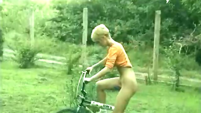 Slutty short-haired babe on a bike fucks for sticky jizz