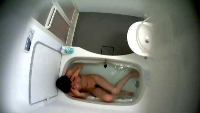 Hidden camera caught my Japanese coworker bitch in shower