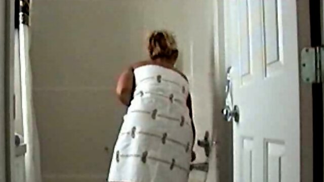 Sexy blonde wifey masturbating after shower on hidden cam