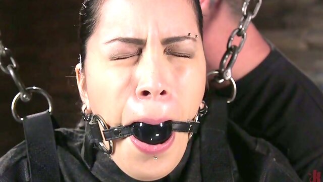 Obedient whore in straitjacket gets tied up and masturbated hard