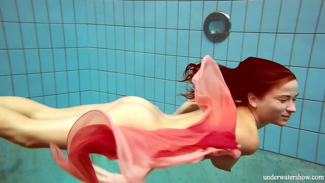 Underwater solo show of well swimming beauty with juicy tits Deniska