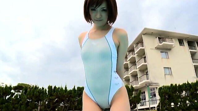 Japanese sweetie in bathing suit Ryoko Tanaka walks around pool