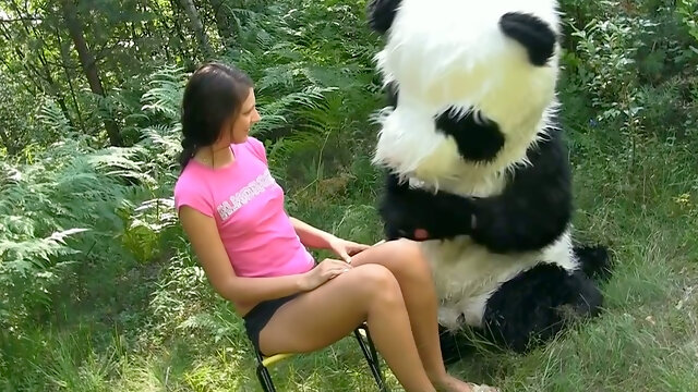 Playful brunette teen Molly undresses in front of guy in Panda costume