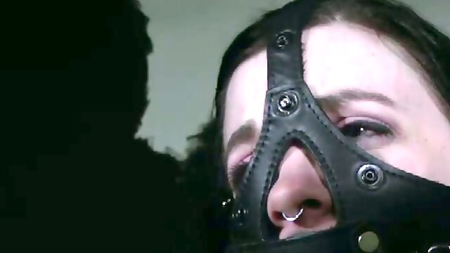 Horny bondage master is having fun with his slaves tits