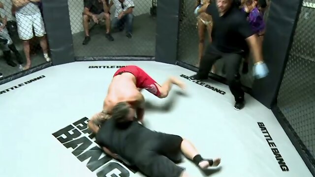 After steamy MMA fight lusty ring girl Ruby Rayes gives solid blowjob