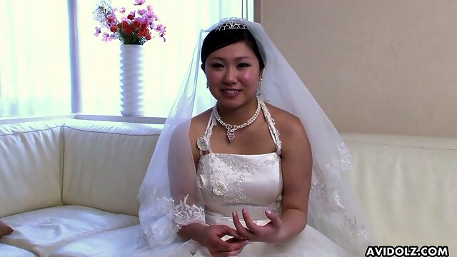 Naughty Japanese bride Emi Koizumi lets dude rub her clit and play with tits