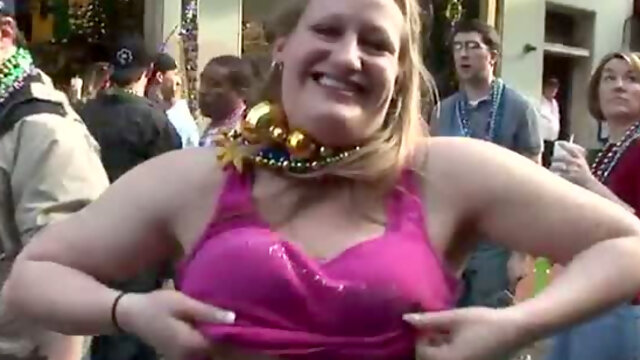 Fuck hungry mature sluts show off their saggy boobies in public during festival