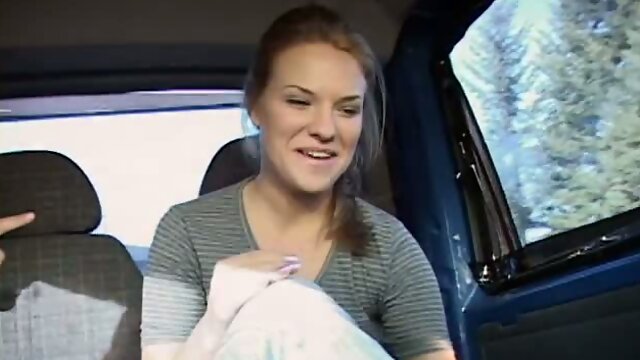 Amateur redhead chick Lucy strips in a car exposing fresh sexy body