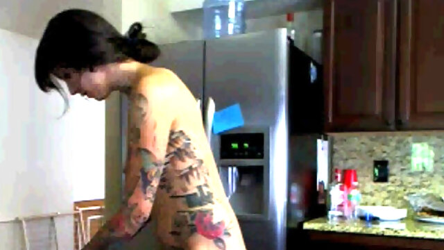 Naked Tattoo Slut Cleans Kitchen.