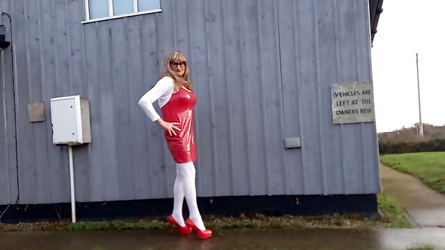 Tranny Outdoors Pissing in Red PVC Dress