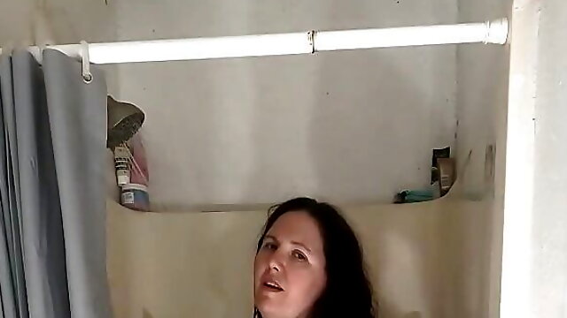Thick MILF Takes Long Shower Takes Large Dildo in Ass Stuck on Shower Wall