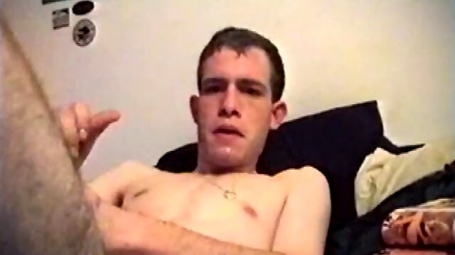 Putting his hairy ass and balls in our face, Nate gets a hard-on, with a little help from some porn magazines. The young man kneels on top of his porn, and a box, with a pillow tucked between his legs.