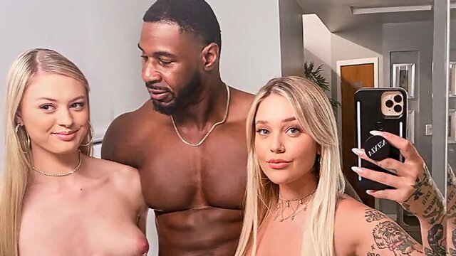 Kali Roses and Amber Moore are enjoying interracial dick-riding
