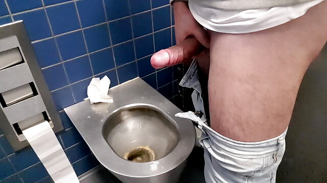 Big fat cock with ring jerk off in public toilete in Germany.