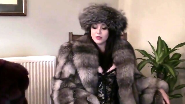 Kinky amateur brunette chick in a fur coat solo