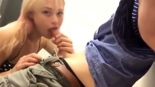 Blonde college girl sucks a lucky nerd in changing room