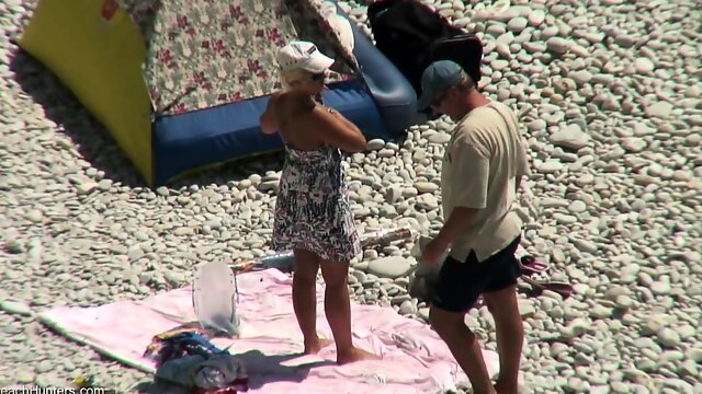 Hidden vid of French woman fingered on beach