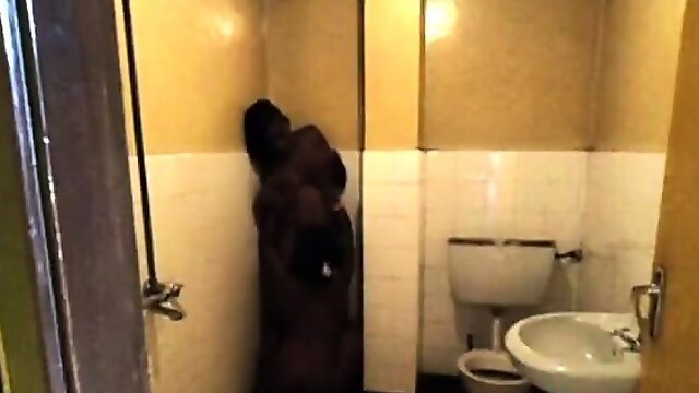 African lesbians Ivie & Silver fuck in public bathroom