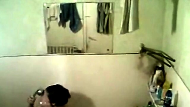 Here my showering mom on spy camera