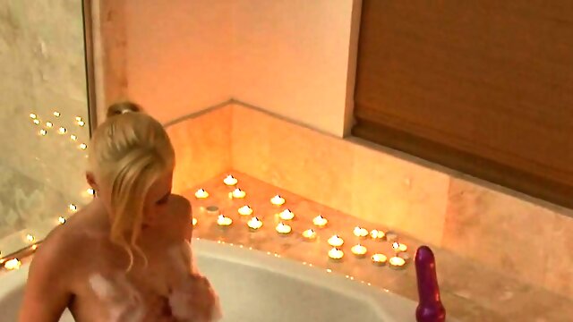 Blonde Rides Dildo in Tub