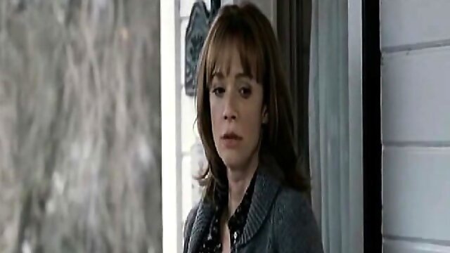 Lauren Holly naking out with a guy in bed as she pulls her