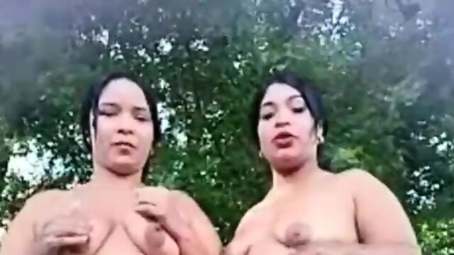 Two cute and chubby girls pissing in each others faces