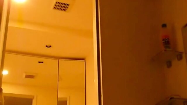 Asian Stepmom soaps her body in the shower