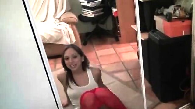 Teen seductress working pussy in the mirror