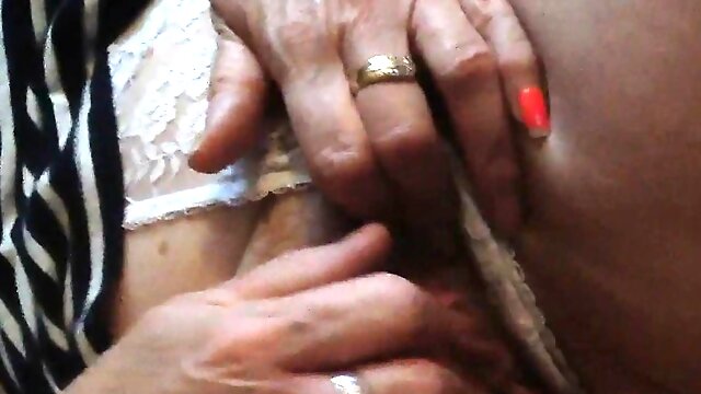 Grannys muff being taken care of - closeup