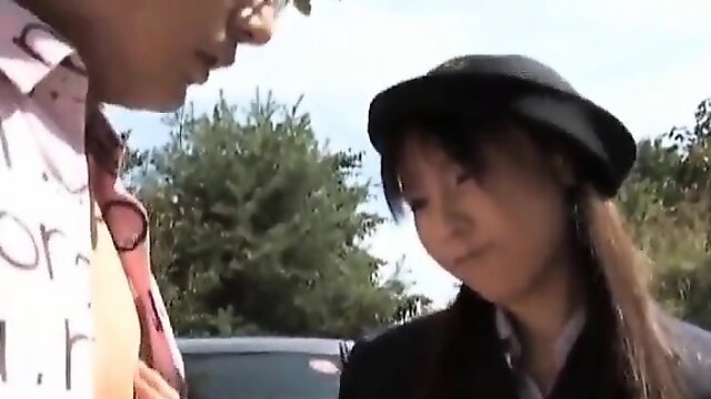 Asian police person Momo gives arousing blowjob in public