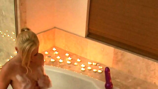 Blonde Rides Dildo in Tub