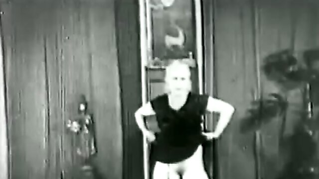 Natural blonde makes a strip show in 20s porn film