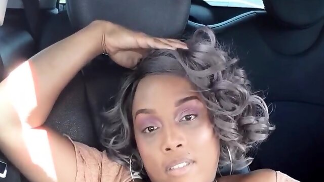 Stacked ebony milf taking herself to orgasm in the car